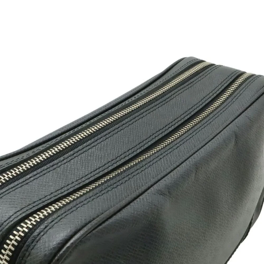 Louis Vuitton Taiga Pavel Clutch